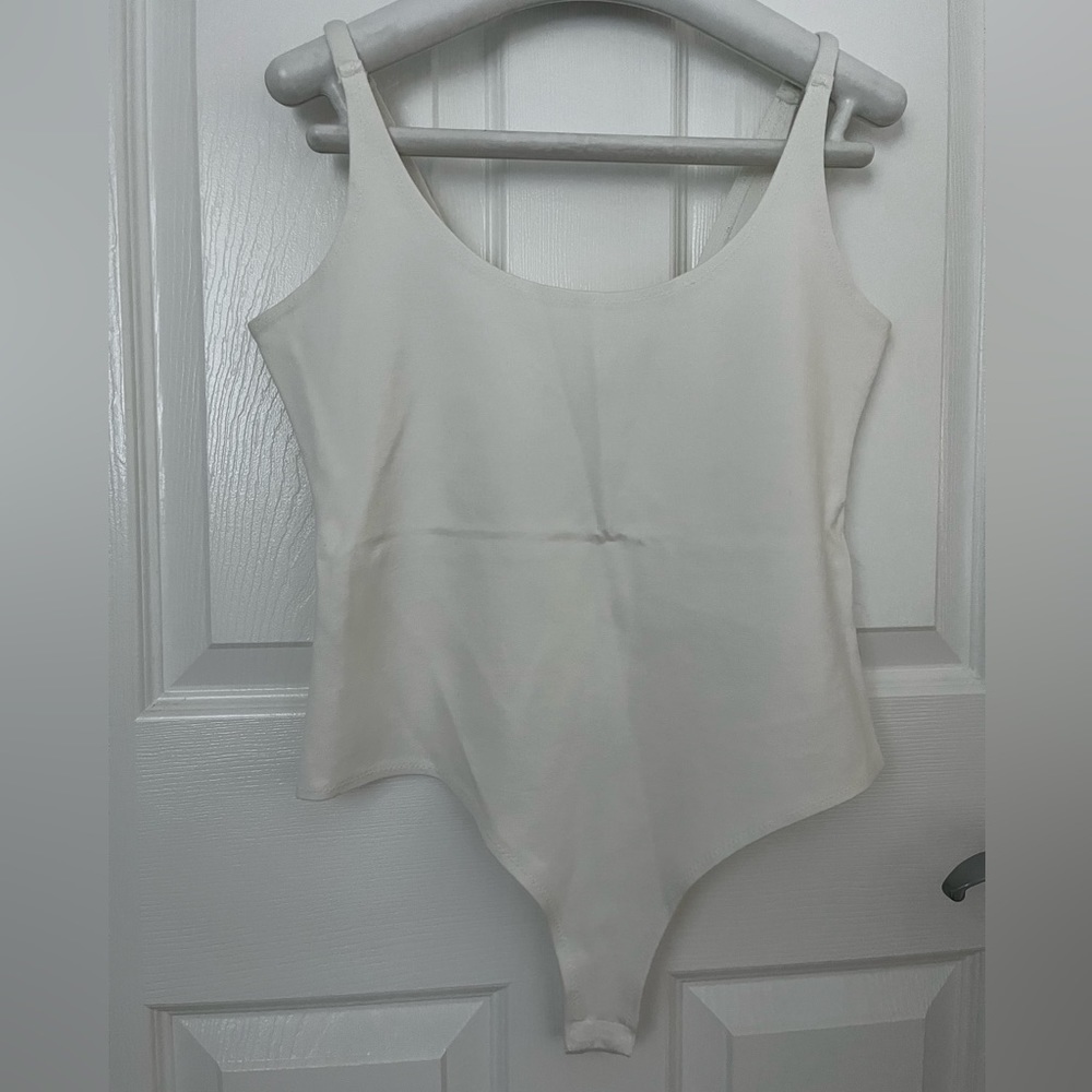 Stella Luce White Bodysuit, Size Medium.